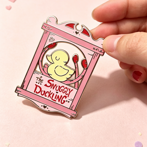 The Snuggly Duckling Enamel Pin